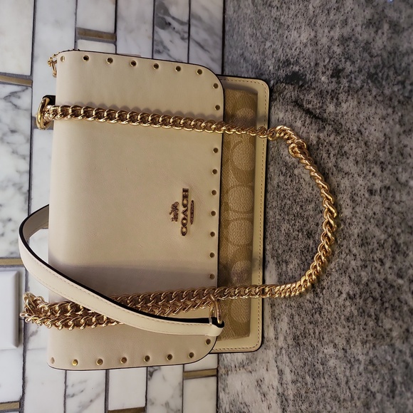 Coach Handbags - Coach Snake Print Accordian Crossbody